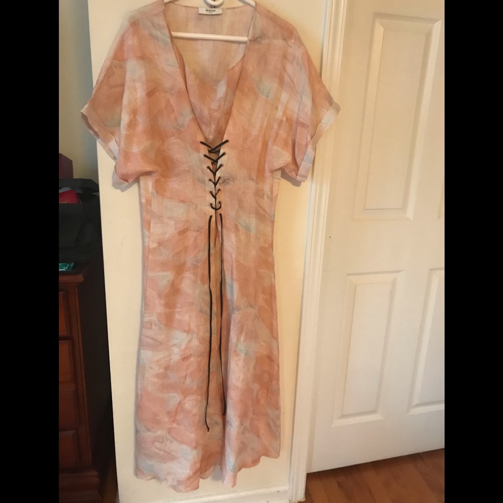 A pink flowy silk marysia dress